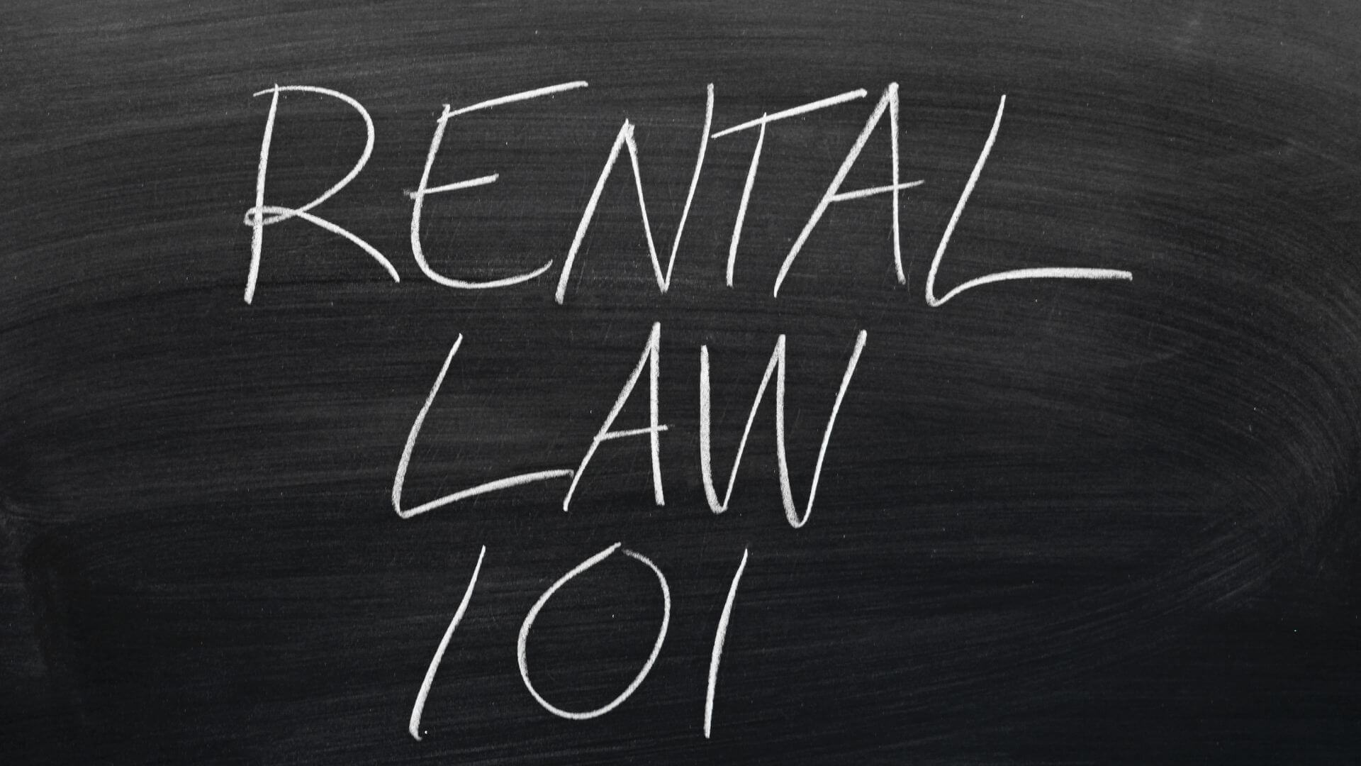 Chalkboard with the phrase 'RENTAL LAW 101' written in large, bold letters, highlighting the introduction of new rental rules in South Australia.